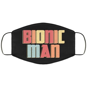 May include: Black face mask with the text "Bionic Man" in a retro style font with colorful letters.