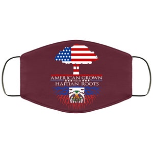 May include: A maroon face mask with a tree design. The tree trunk is the Haitian flag and the leaves are the American flag. The text reads "American Grown with Haitian Roots".