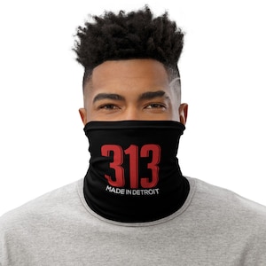 May include: A black face mask with the number 313 in red and the text "MADE IN DETROIT" in white.
