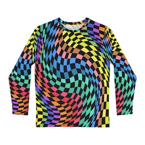 May include: Long-sleeved shirt with a colorful checkered pattern that appears to be swirling. The pattern is made up of black, white, red, orange, yellow, green, blue, and purple squares.