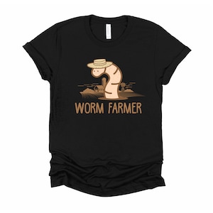 May include: Black t-shirt with a cartoon worm wearing a straw hat and the text "Worm Farmer".