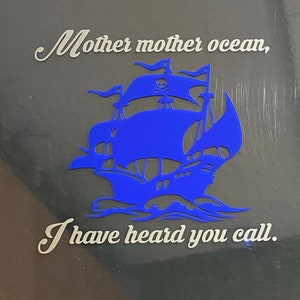 May include: A blue silhouette of a pirate ship with a skull and crossbones on the sail. The text "Mother mother ocean, I have heard you call." is written in white on a dark background.