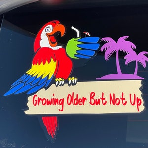 TROPICAL Jimmy Buffett themed car decal/sticker “Growing Older But Not Up”  5 1/2 in X 5 1/2 in