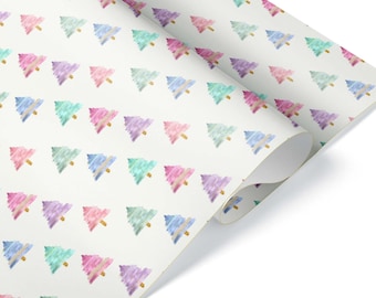 May include: White wrapping paper with a repeating pattern of pastel-colored Christmas trees. Each tree is a different color, including pink, purple, blue, and green, with a gold trunk. The paper is rolled up in the corner.