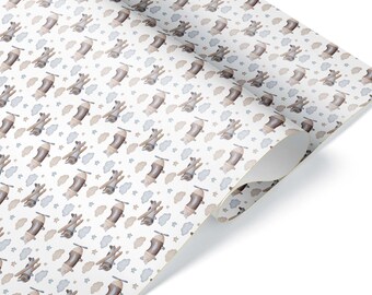 May include: A roll of wrapping paper featuring a repeating pattern of brown and beige vintage-style airplanes, light blue and beige clouds, and small gray stars on a white background. The paper is partially unrolled to show the print design.