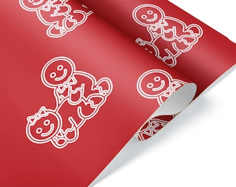 May include: Red wrapping paper with a repeating pattern of white gingerbread people. The gingerbread people have smiling faces and are outlined in white. The paper is partially rolled, revealing the white underside.