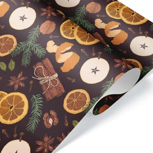 May include: Decorative wrapping paper featuring a repeating pattern of dried orange slices, star anise, cinnamon sticks, apple slices, cloves, and walnuts on a dark brown background. The paper is rolled up at the corner.