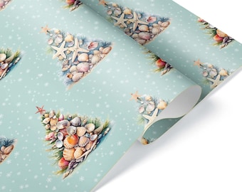 May include: A blue wrapping paper with a repeating pattern of Christmas trees made of seashells, starfish, and a red star on top. The background is a light blue with white snowflakes.