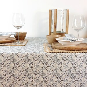 Coated tablecloth in Vosges cotton with blue flowers. image 1