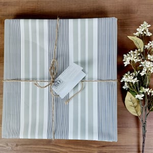 Coated tablecloth in beige and black striped Vosges cotton