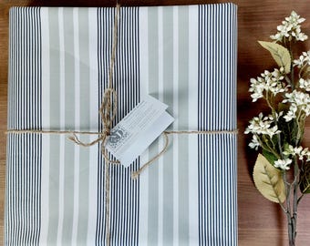 Coated tablecloth in beige and black striped Vosges cotton