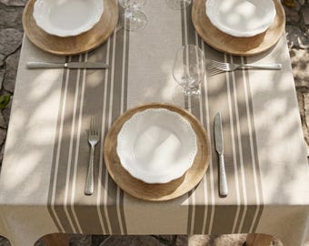 Coated tablecloth with grey stripes on an ecru background