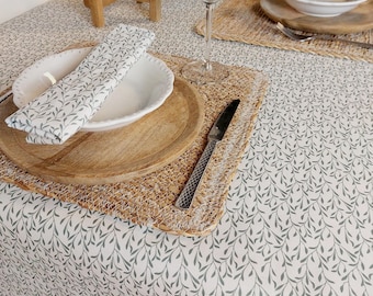French coated tablecloth with green branch pattern