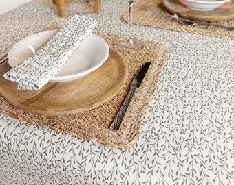 French coated cotton tablecloth from the Vosges, white and green plant pattern.