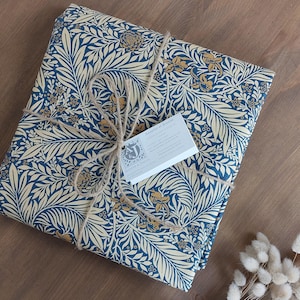 Coated Cotton Tablecloth easy to clean – blue, chesnuts and yellow.