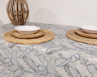 French coated cotton tablecloth from Vosges with blue palm leaves. Round, oval, rectangle, square tablecloth, custom dimensions.