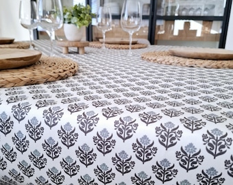 Coated cotton tablecloth from Vosges with blue Indian patterns