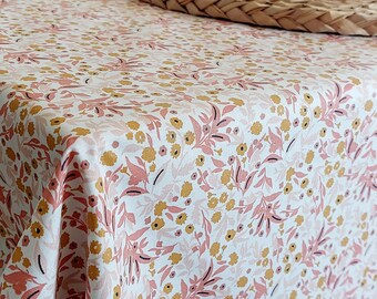 Nappe enduite florale rose et jaune. 140g/m2