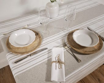 Coated tablecloth with white stripes on a light grey background