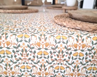 Coated cotton tablecloth from Vosges with green and yellow floral pattern