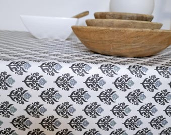 Coated cotton tablecloth from the Vosges with blue Indian patterns