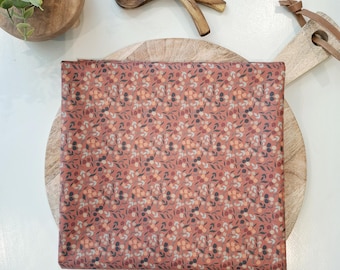 Orange coated tablecloth with flowers in Vosges cotton. Made in France.