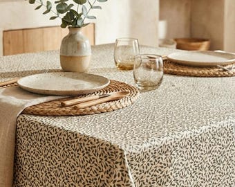 Coated tablecloth with green foliage in Vosges cotton.