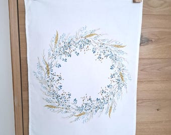 Cotton tea towel with blue and beige watercolor crown