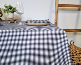Cotton tablecloth with blue gingham pattern. Square, round, rectangular or oval tablecloth on request.