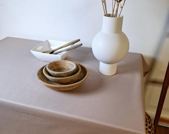 Plain grey/taupe stain-resistant coated tablecloth.