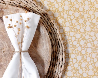 Coated tablecloth with yellow flowers. Made in France.