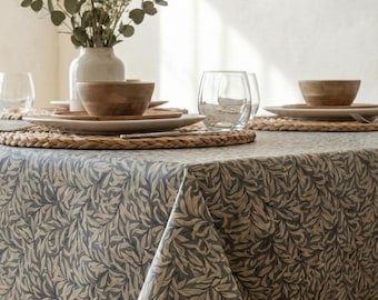 Grey coated tablecloth with foliage pattern. Easy to care for
