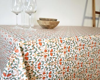 French coated cotton tablecloth from the Vosges – orange floral pattern on a white background – Durable, waterproof and easy to maintain