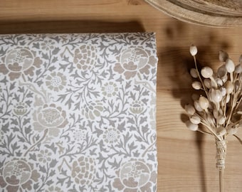 Coated tablecloth with floral pattern, grey, white, beige.