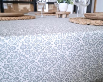 Coated tablecloth, sponge washable. Sky blue baroque floral pattern.
