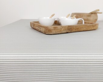 Nappe enduite en coton des Vosges à rayures blanc et beige. Nappe carre, rectangle, ronde, ovale et sur-mesure. Fabrication française
