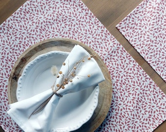 Red and white coated cotton placemats. French made