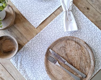 Taupe and white coated cotton placemats. Myriam Collection