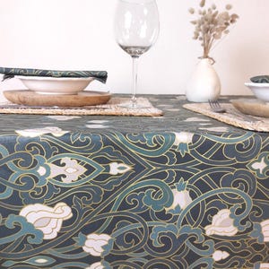 Blue and green coated cotton tablecloth from the Vosges, baroque style