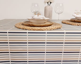 French coated cotton tablecloth with multi-colored stripes.