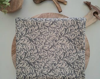 Grey coated tablecloth with foliage. Round, square, rectangular, oval, custom-made tablecloths.