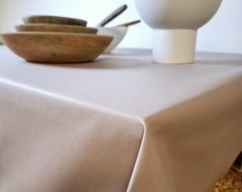 Plain stain-resistant coated tablecloth.