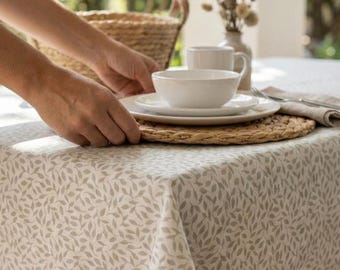 Vosges cotton coated tablecloth – Beige and white floral pattern.