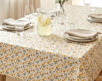 Easy-care coated tablecloth with yellow pear print