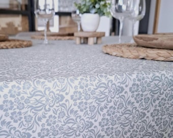 Coated tablecloth, sponge washable. Sky blue baroque floral pattern.