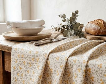 Yellow and grey floral tablecloth in coated cotton – Soft and bright country style.