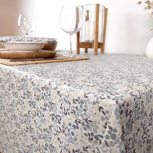 Coated tablecloth in Vosges cotton with blue flowers. image 3
