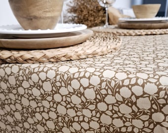French coated tablecloth in Vosges cotton with a "cream" floral pattern on a "café au lait" background