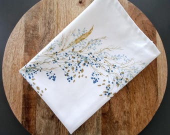 Cotton tea towel with blue and beige watercolor crown