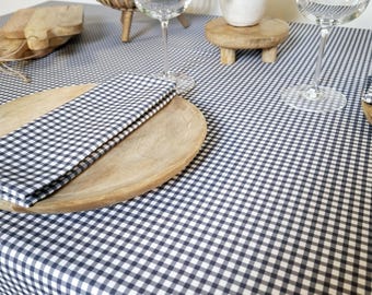 Cotton tablecloth with blue gingham pattern. Square, round, rectangular, or oval tablecloths available upon request.